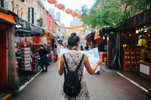 Tourist walking through Chinatown Singapore