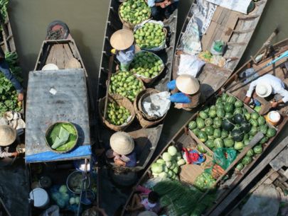 Traders in floating market Mekong Delta Listing Box